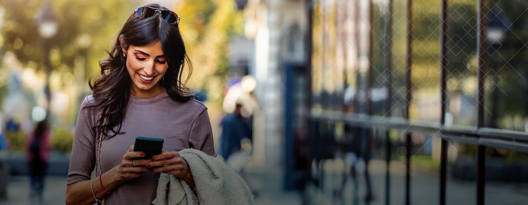 a woman looking at her phone