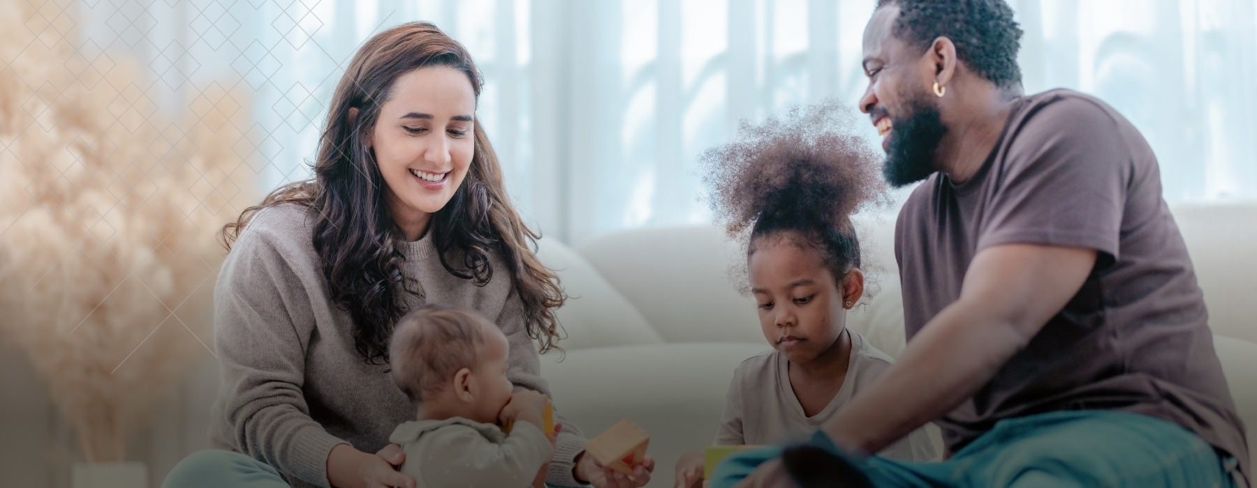a family sitting on the floor