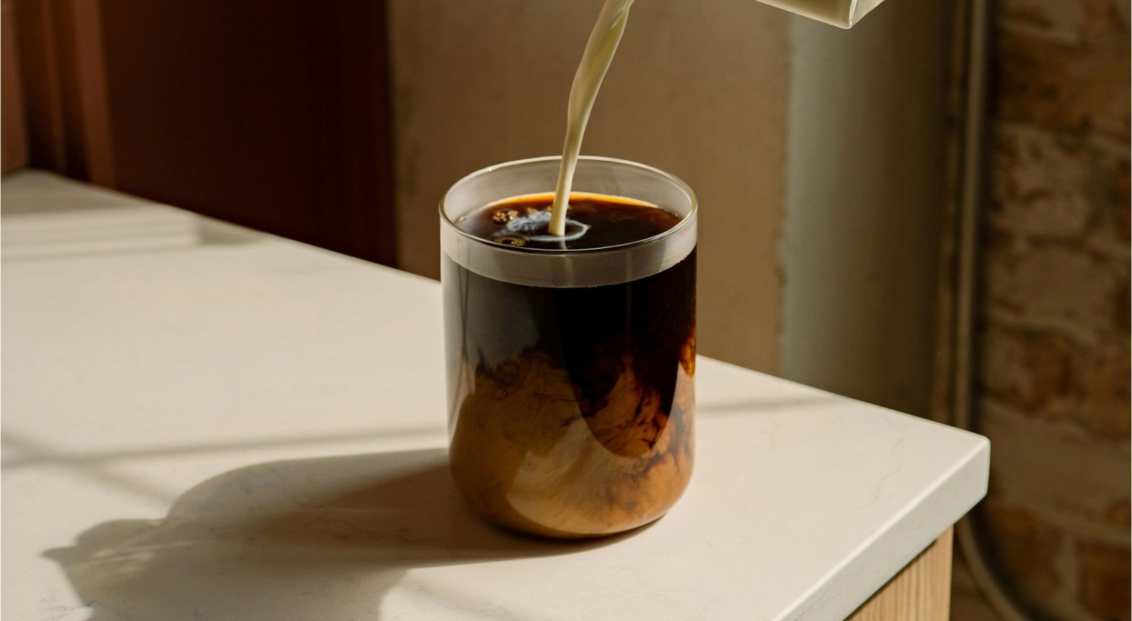 a cup of coffee on a counter