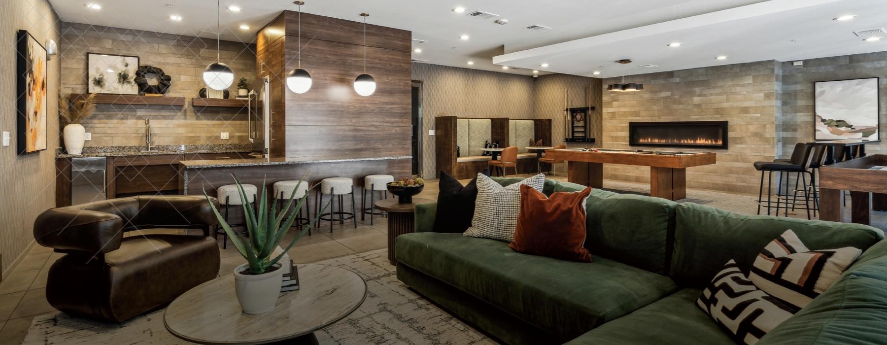 a clubroom with a couch and chairs